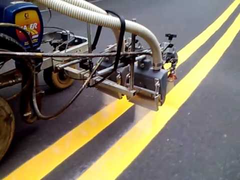 Striping reflective glass beads, slow motion